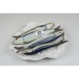 White Cabbage Leaf Plate decorated with Four Relief Moulded Sardines, d.23cms