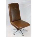 Mid 20th century Style Tan Brown Leather Effect Upholstered Swivel Chair raised on a Chrome Base