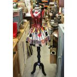 A half length torso manakin lady in gambling steam punk dress.