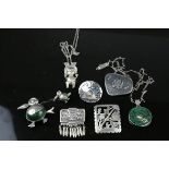A collection of seven Mexican / Peruvian 925 sterling silver brooches and pendants.