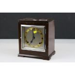 An Art Deco mahogany two train mantle clock marked Sorley Glasgow to dial.raised on a plinth base.