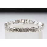 A silver and CZ set line bracelet