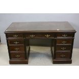 A late Victorian mahogany pedestal desk stamped 'HEAL & SON, LONDON', the rectangular top above a