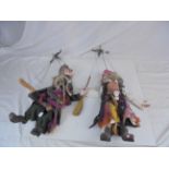 Two puppets in the form of witches