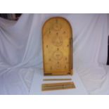 Wooden bagatelle board with balls and wooden score marker