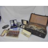 Collection of silver plate in a vintage suitcase