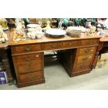 Victorian Walnut Twin Pedestal Desk with Leather Inset Top over an arrangement of nine drawers, h.