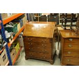 19th century Mahogany Bureau, the drop front with fitted interior, over four long drawers and