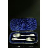 A fully hallmarked Victorian sterling silver cased fork & spoon christening set with bright cut