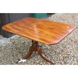 19th century Mahogany Rectangular Tilt Top Table raised on central support, the three splayed with