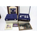 A collection of commemorative coins and medallions, mainly in presentation cases to include a