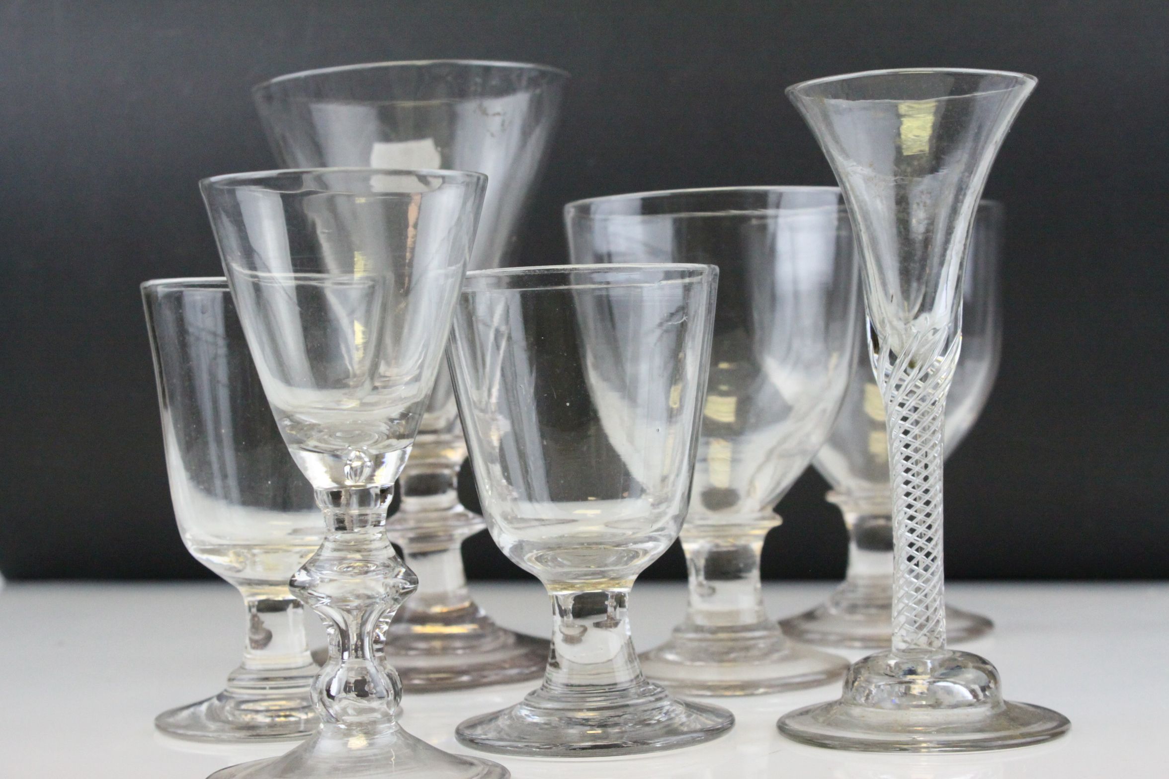 Collection of Twenty mainly Antique Drinking Glasses including one with an Air Twist Stem