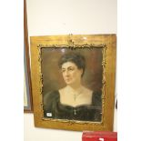 Gilt framed early 20th century pastel portrait of a lady wearing crucifix. 58 x 50