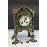 Art Nouveau Gilt Metal Mantle Clock, the case cast with sinuous relief decoration of a lady and