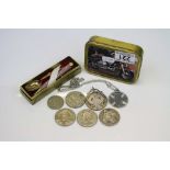 A small collection of coins to include 3 x five pound coins together with a commemorative pen and