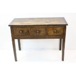 18th / 19th century Elm Side Table with Three Small Drawers raised on square legs, h.78cms w.103cms