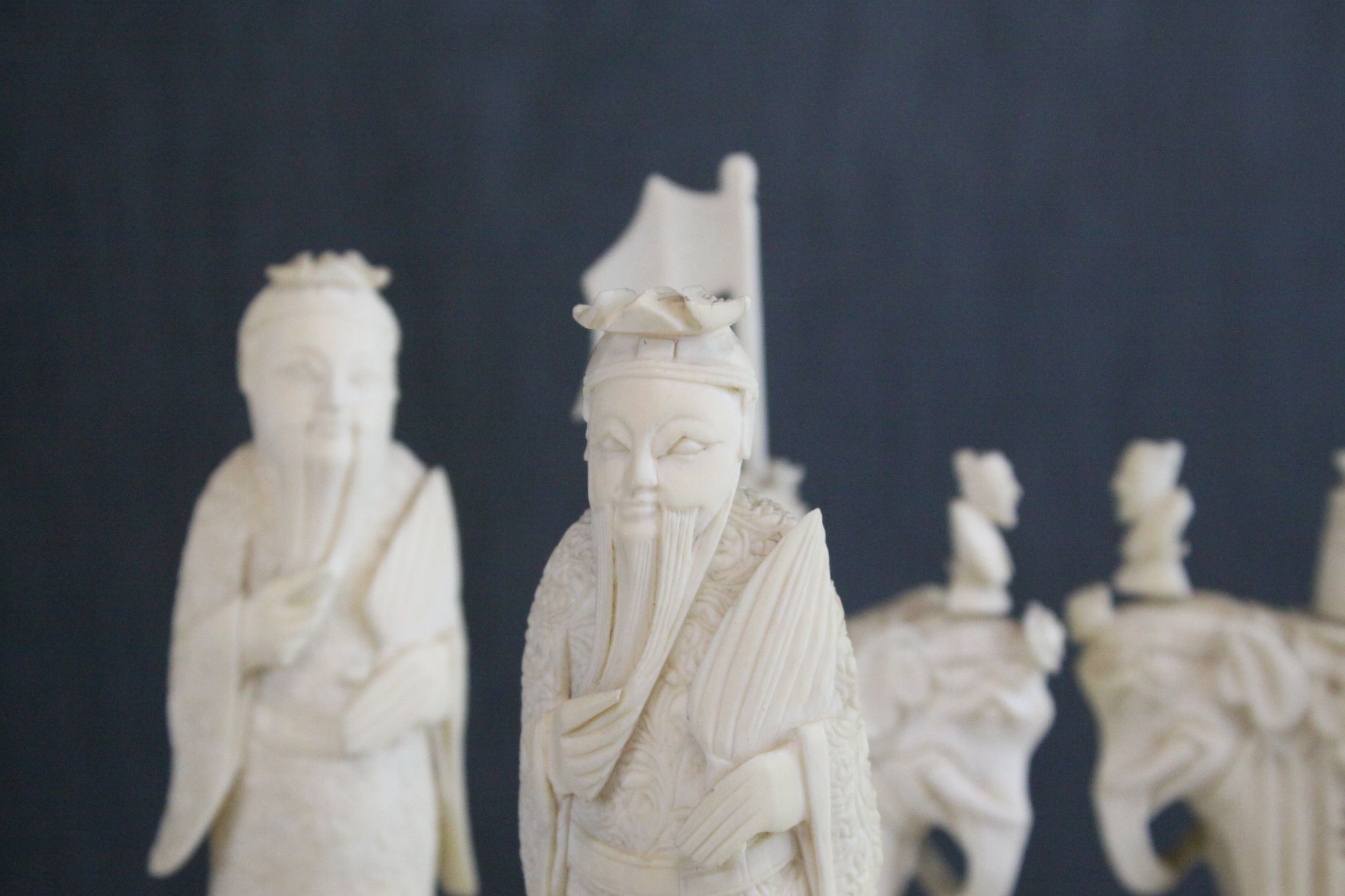 A 19th Century Chinese export carved ivory figural chess set, Canton. The white and red side - Image 19 of 26