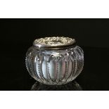 A fully hallmarked sterling silver topped cut glass vanity jar with a maker mark for J.C. Plimpton &
