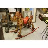 1950's Mobo Tin Plate Rocking Horse stamped ' Made in England ', L.93cms
