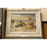 A swept framed oil painting of a Victorian beach scene with figures and dog, 28 x 38cm