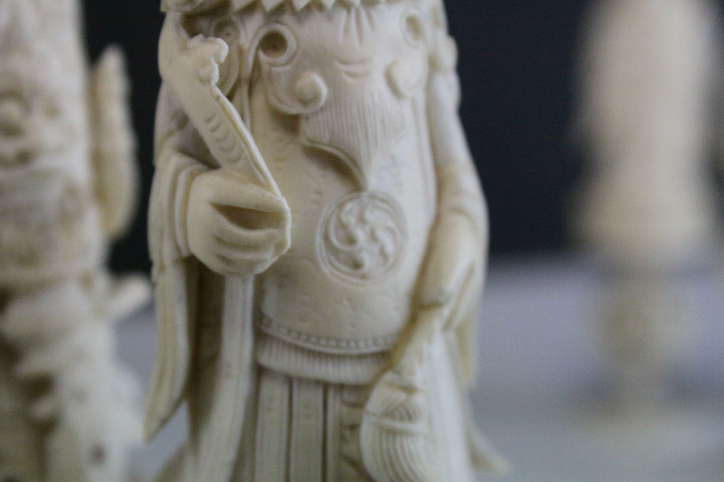 A 19th Century Chinese export carved ivory figural chess set, Canton. The white and red side - Image 17 of 26