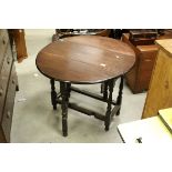 Small Antique Mahogany Oval Gate-leg Table raised on turned baluster and block supports. h.66cms L.