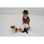 Royal Doulton figure of a fox dressed as a hunt master together with a Royal Doulton dog.