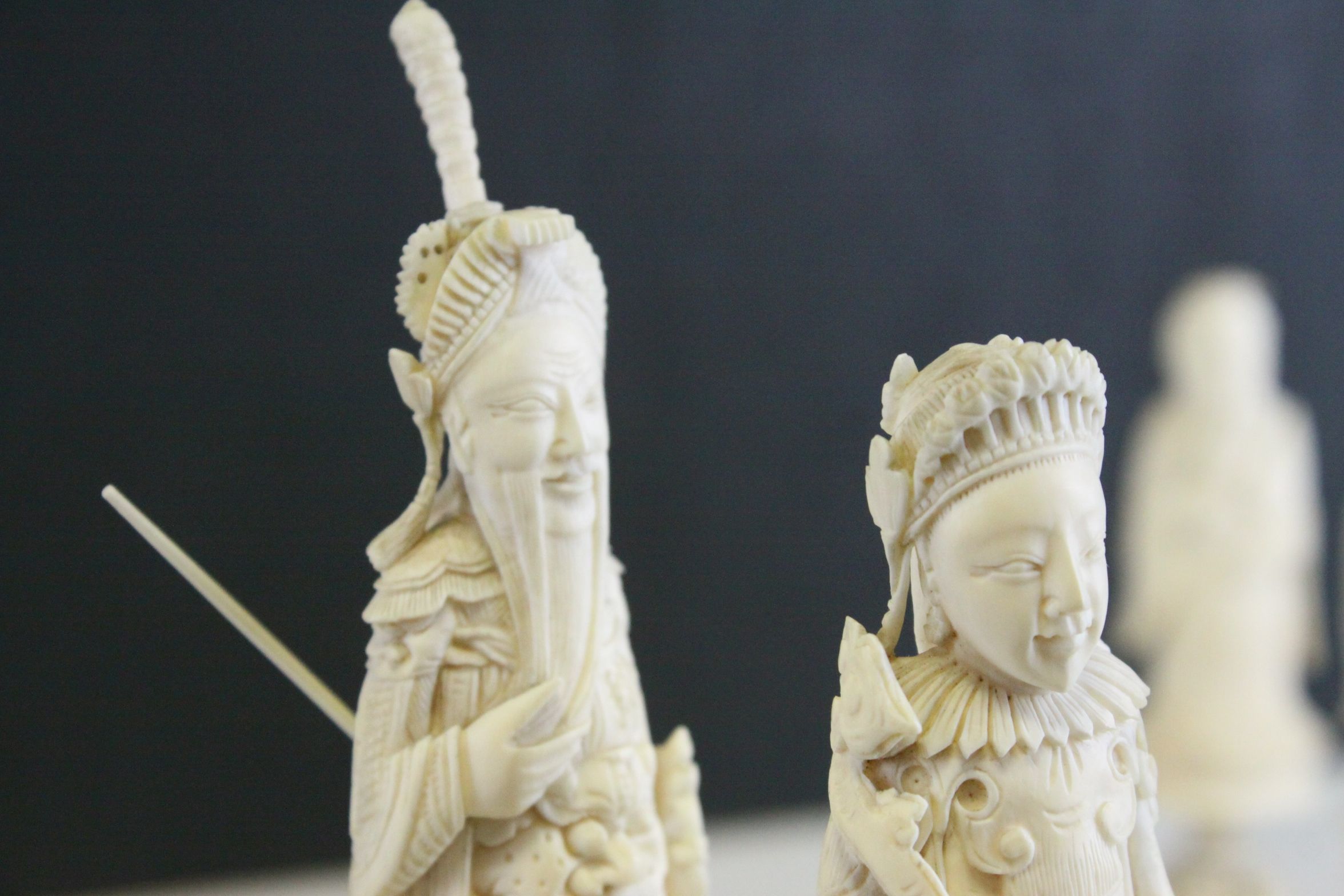 A 19th Century Chinese export carved ivory figural chess set, Canton. The white and red side - Image 16 of 26