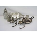 Collection of silver plated items to include a pepper grinder, a lemon juicer by Hukin & Heath, a