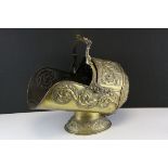 Victorian Brass Helmet Shaped Coal Scuttle with embossed foliate scroll decoration, 45cms high