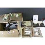 A quantity of glass negatives, albums of black and white topographical and family portrait images.