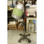 A mid century J W Holland freestanding hair dryer converted to a standard lamp.
