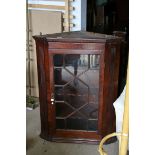 Early 19th century Mahogany Corner Cabinet with single glazed door, h.98cms