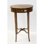Mahogany Oval Lamp Table with small drawer and raised on slender legs, h.72cms w.45cms