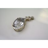 A 9ct gold mounted quartz pendant.