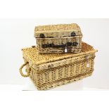 A set of three graduated wicker picnic baskets