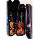Two Stentor cased student violins .