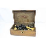 An antique weighted Jaques Style wooden chess set in oak box.