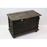 19th century Continental Carved Oak Coffer, the front and side panels carved depicting classical