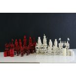 A 19th Century Chinese export carved ivory figural chess set, Canton. The white and red side