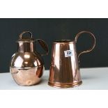 A large copper Guernsey creamer milk jug together with a similar measuring tankard.