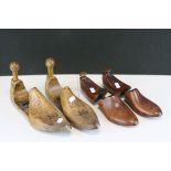 A group of vintage shoe trees