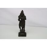 A bronze indian deity figure, stands approx 16.5cm tall.
