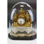 19th century Continental Ornate Gilt Metal Figural Mantle Clock raised on a White Onyx Base and
