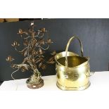 A folk art seven branch electric candle stand in the form of a tree together with a brass coal