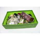 A box of mixed collectables to include a silver charm bracelet, a silver topped vanity jar and two