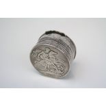 A hinged silver trinket box with crown coin lid and base dated 1821.