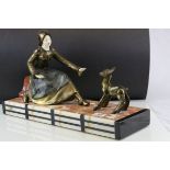 Art Deco Spelter Figure Group of a Young Woman feeding a Goat, raised on a Marble, Slate and Onyx