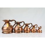 Set of Five Victorian Copper Graduating Jugs ranging from a Quart to 1/2 Gill, largest with stamp