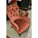 Victorian Spoon Button Back Pink Upholstered Armchair raised on carved scroll front legs